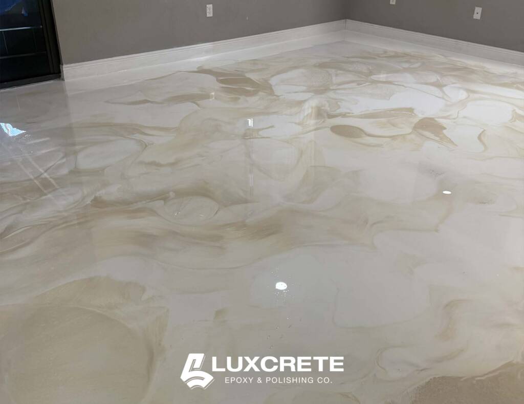 Image of an epoxy floor with a natural marble-stone appearance installed by LuxCrete Epoxy & Polishing Co.