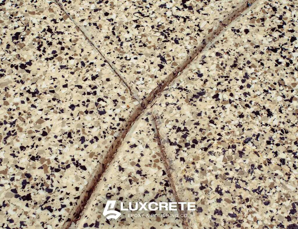 Freeze-thaw crack damage on unsealed concrete garage floor in Wichita, Kansas - Luxcrete Epoxy & Polishing Co - Wichita KS - 002